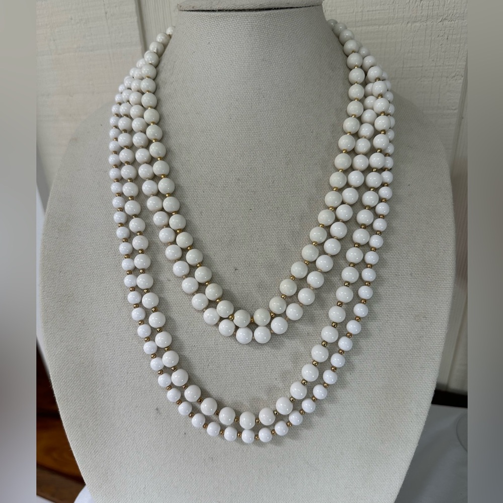 Four vintage old lady style white bead necklaces